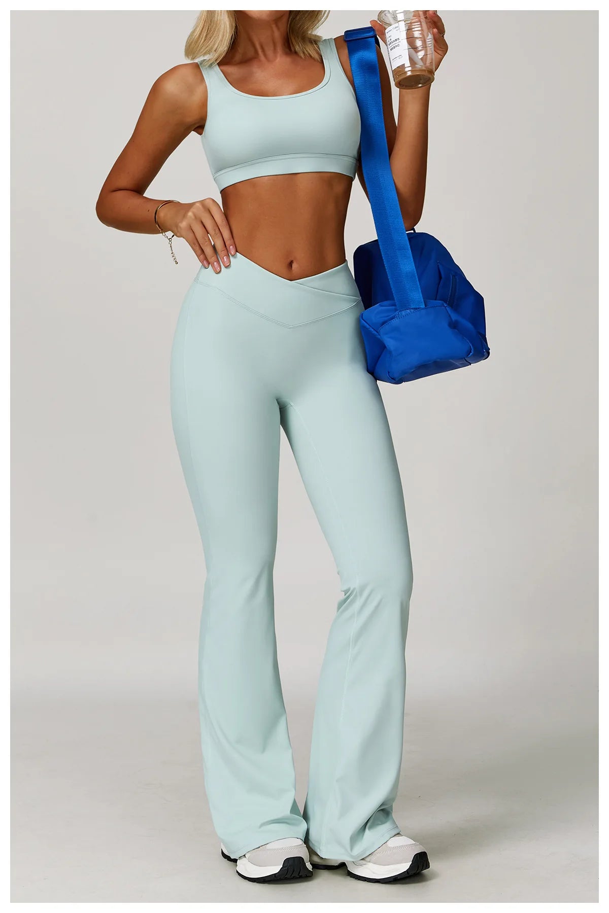 Two-piece women's fitness workout set with sports bra and gym leggings, ideal for yoga, running, and gym workouts by The Clothing Company Sydney.