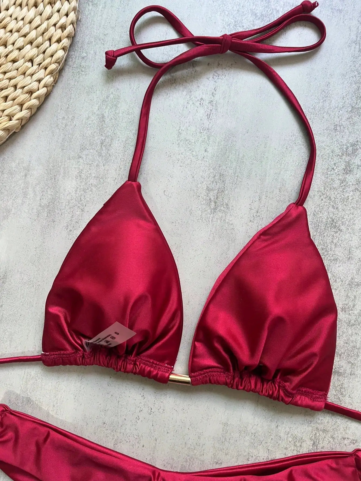 Two-piece foldable micro bikini set for women, triangle swimwear by The Clothing Company Sydney, ideal for beach and swimming.
