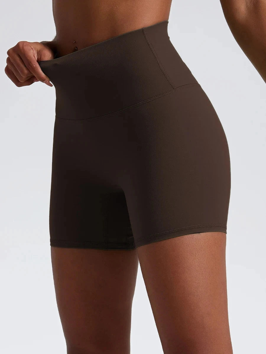 High-waist yoga shorts for women from The Clothing Company Sydney, designed for gym workouts and running, with a sporty fit.