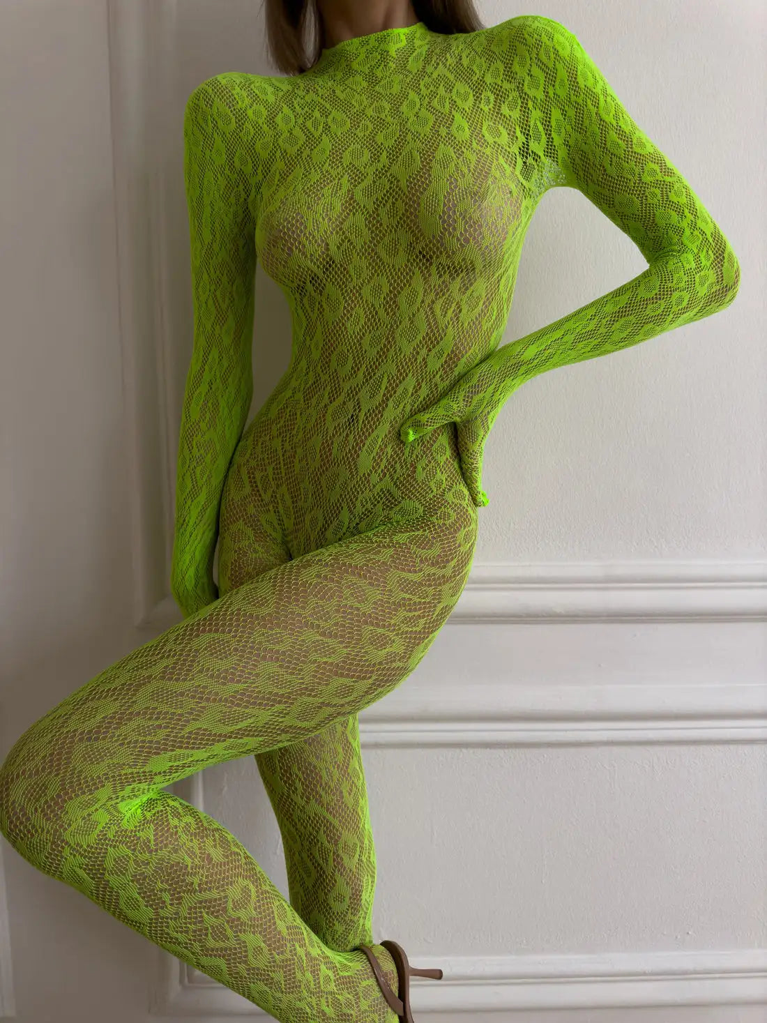 Backless sheer long sleeve jumpsuit by The Clothing Company Sydney, featuring a one-piece cosplay lingerie outfit with a sexy, transparent design.