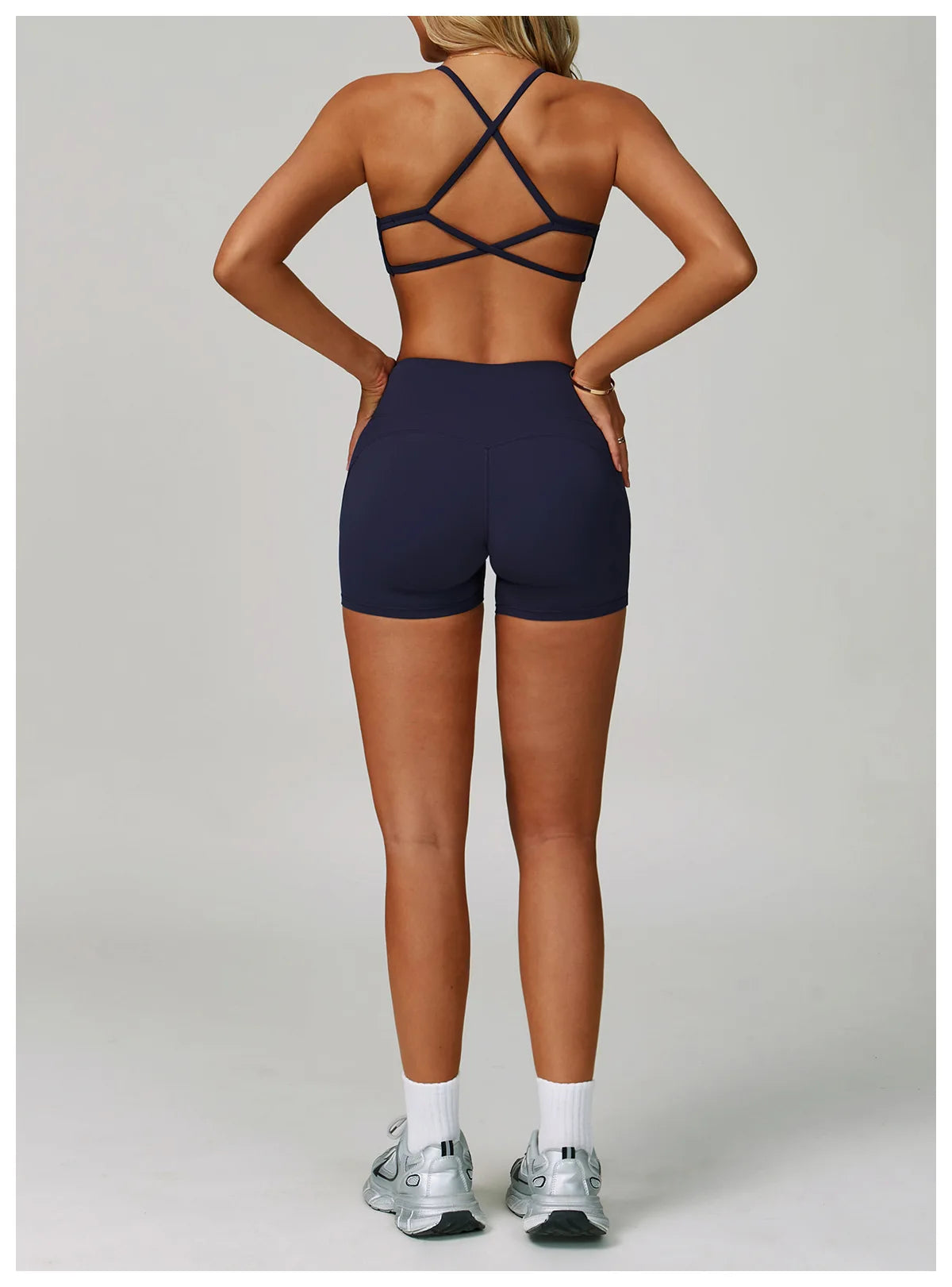 Women's fitness tracksuit set with high-waist leggings and sports bra from The Clothing Company Sydney, ideal for yoga and workouts.