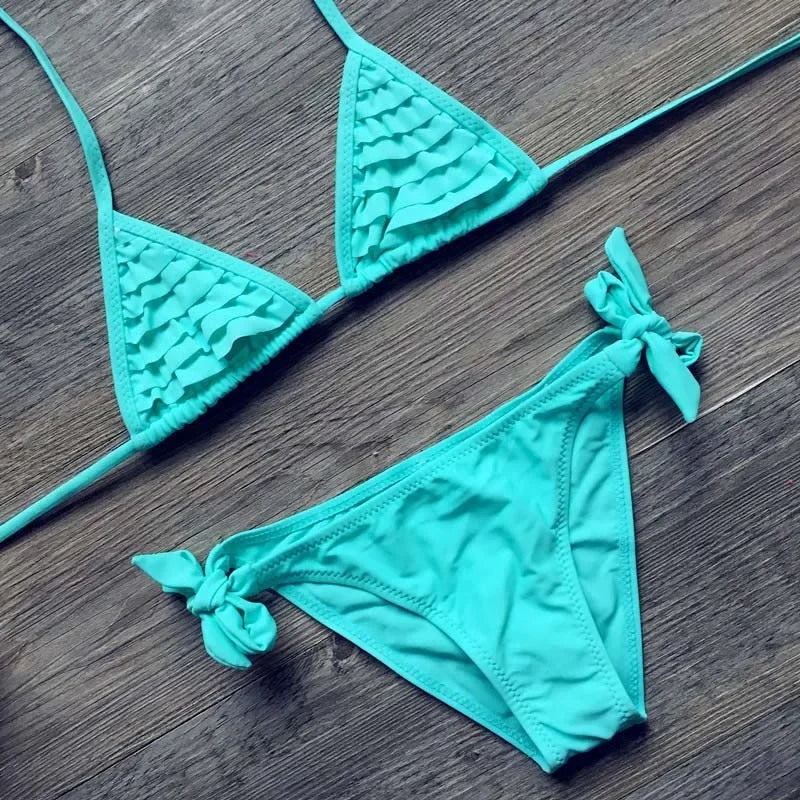 Two-piece girls' swimwear set by The Clothing Company Sydney, featuring colorful swimming suits for children.