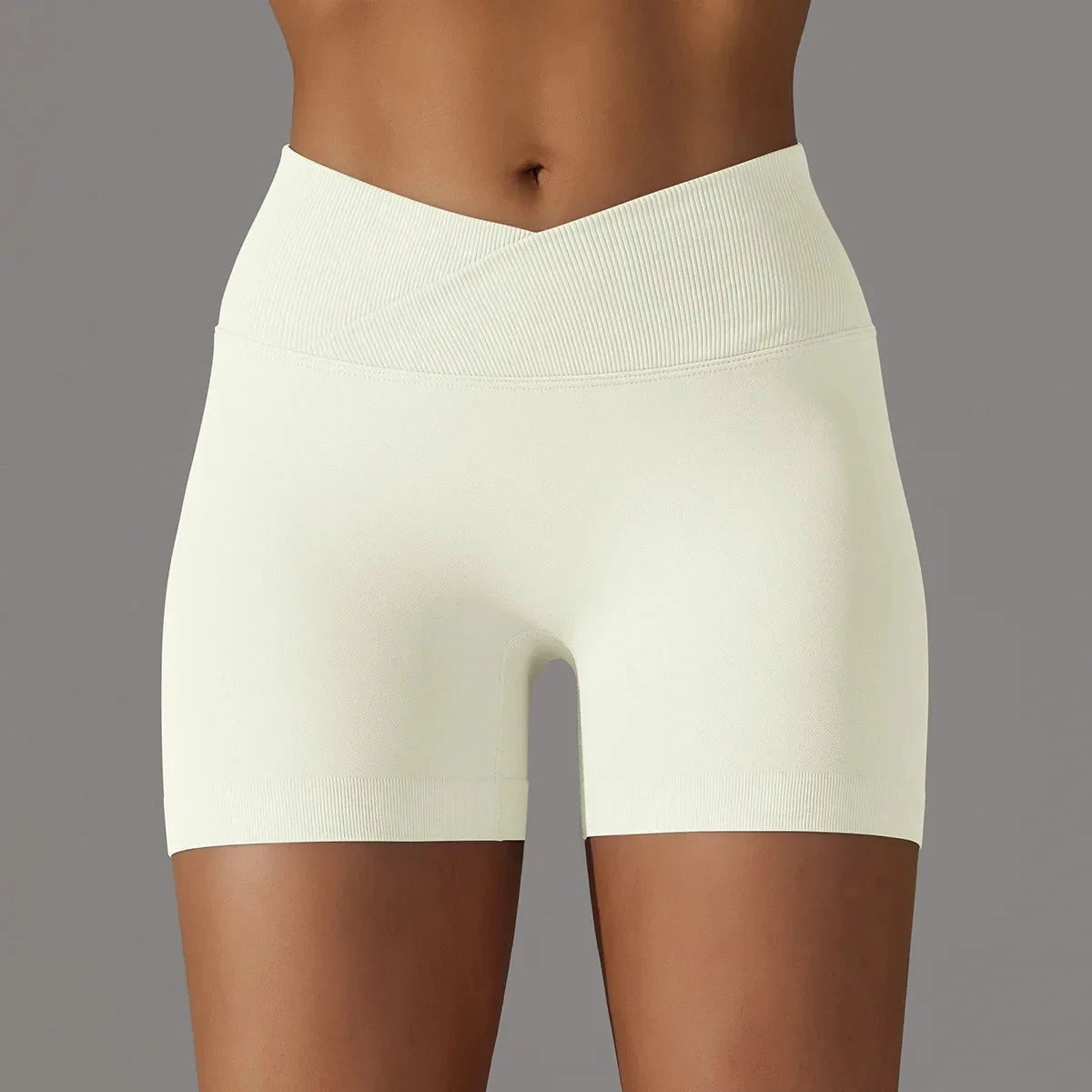 Women’s high waist workout yoga leggings from The Clothing Company Sydney, seamless sports bike shorts with scrunch butt detail.