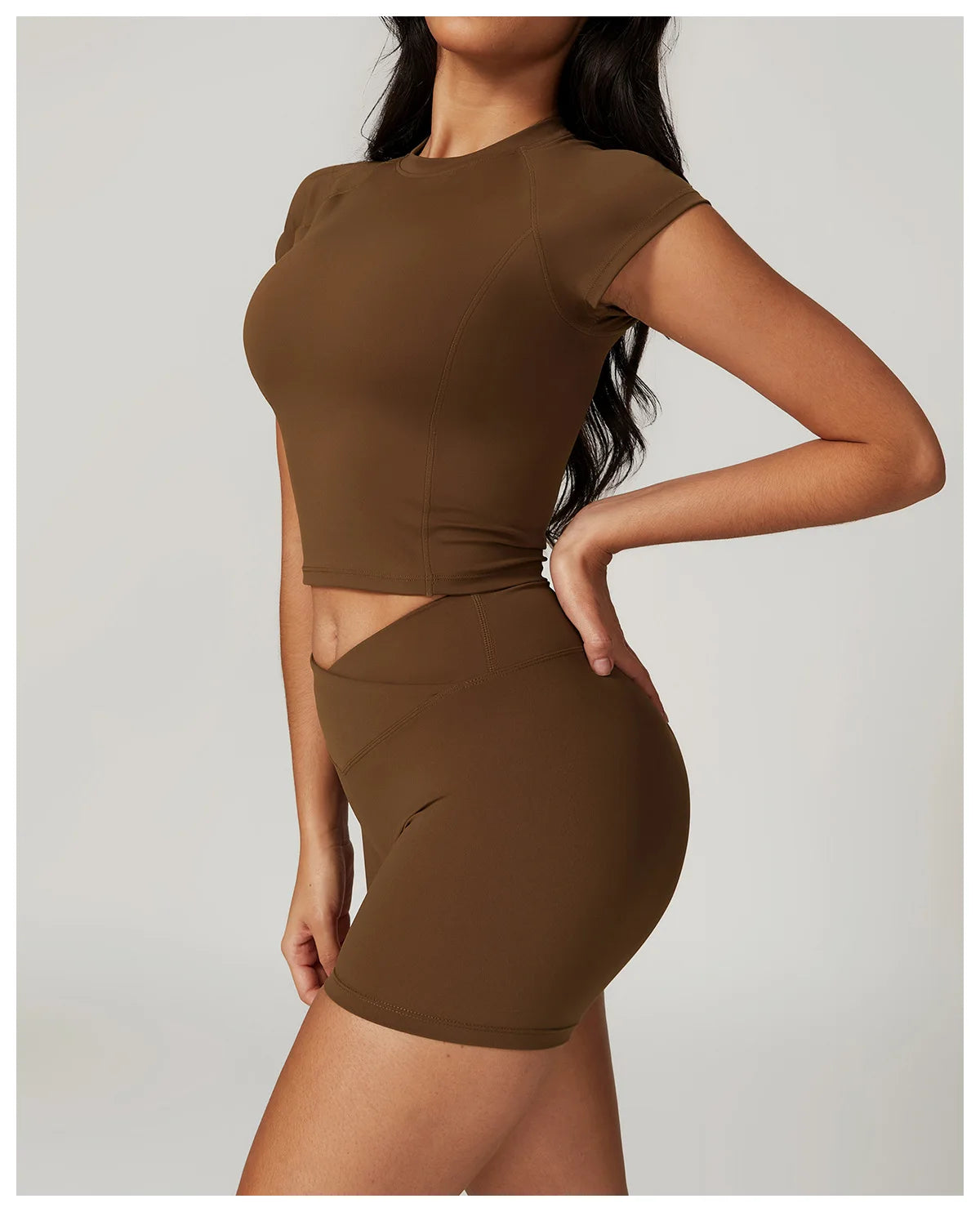Two-piece women's fitness sportswear set including a crop top, sports bra, and leggings by The Clothing Company Sydney.