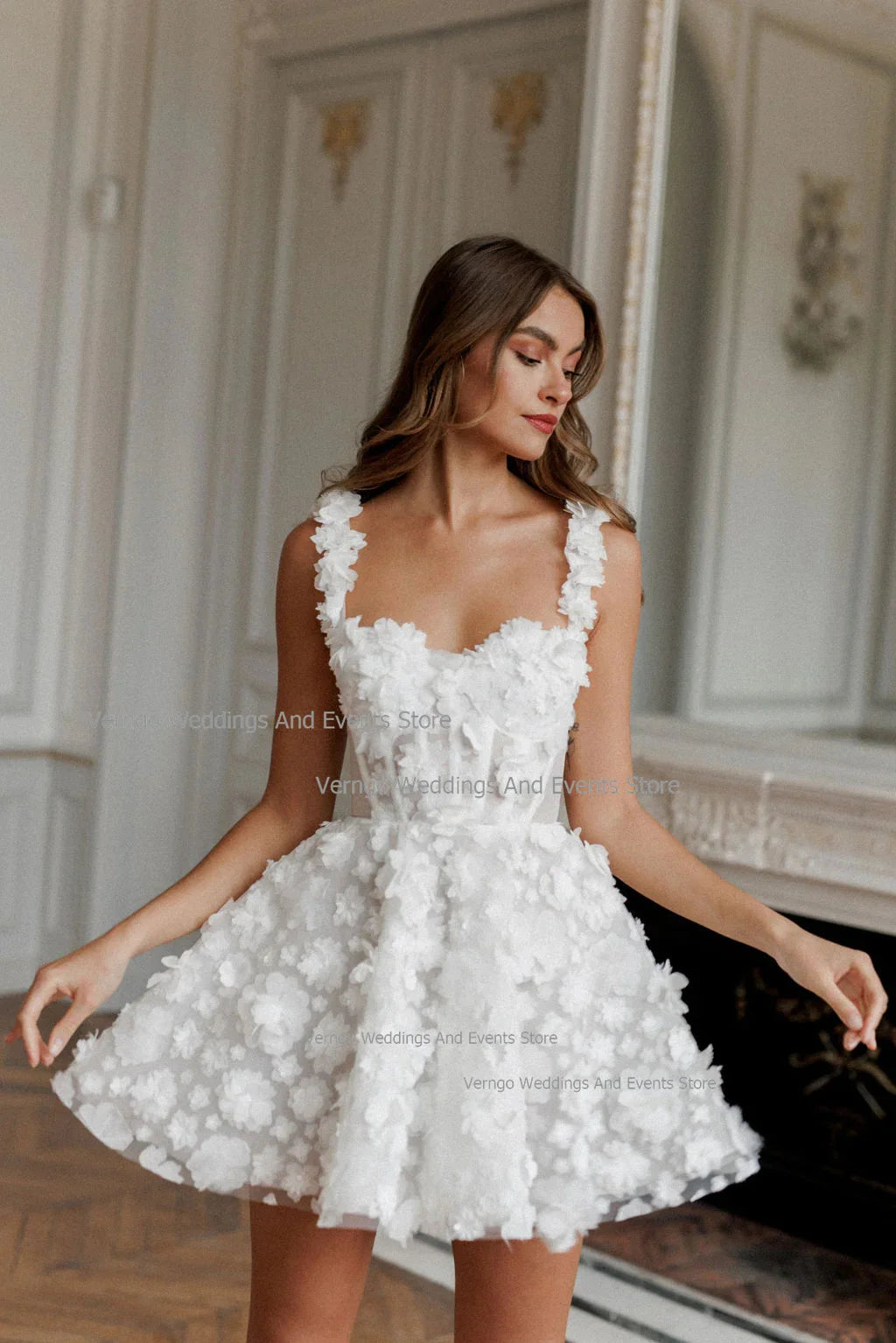 A-line wedding dress with spaghetti straps, sweetheart neckline, back lace-up, above-the-knee length, by The Clothing Company Sydney.