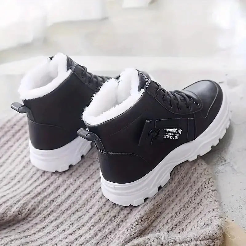 Women’s winter high-top snow boots with lace-up design, warm flannel lining, and wedge sneakers by The Clothing Company Sydney.