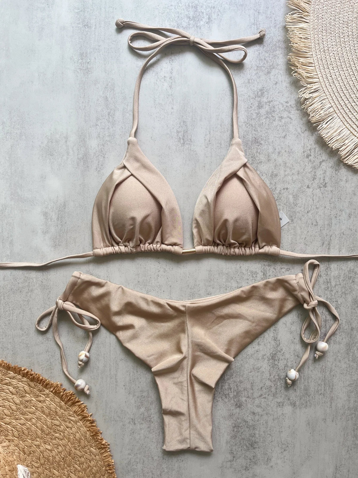 Two-piece micro bikini set for women by The Clothing Company Sydney, featuring triangle swimwear with fold details.