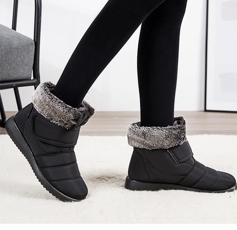 Women's fur-lined waterproof ankle boots by The Clothing Company Sydney with plush insoles and rubber soles for winter warmth.
