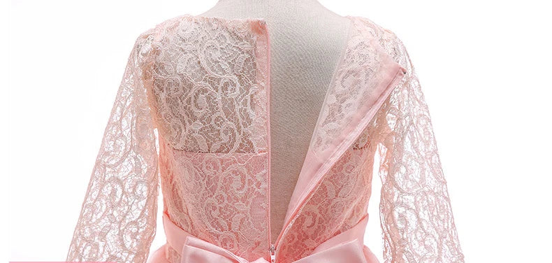 Baby girl princess party gown by The Clothing Company Sydney, white wedding and birthday dress for kids with a regal, elegant design.