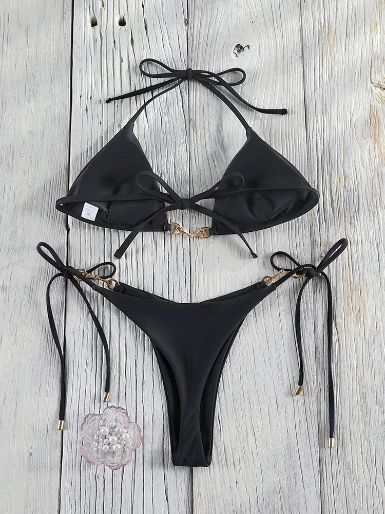 Two-piece push-up bikini set from The Clothing Company Sydney featuring a hollow-out design, low waist, and string-style swimwear.