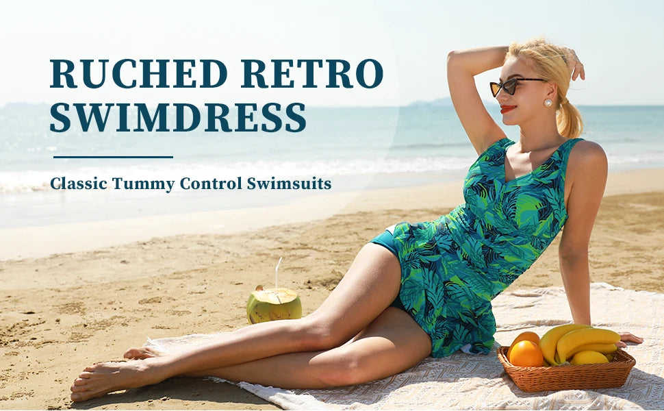 Women’s plus-size floral print modest swim dress by The Clothing Company Sydney, padded one-piece swimsuit with full coverage.