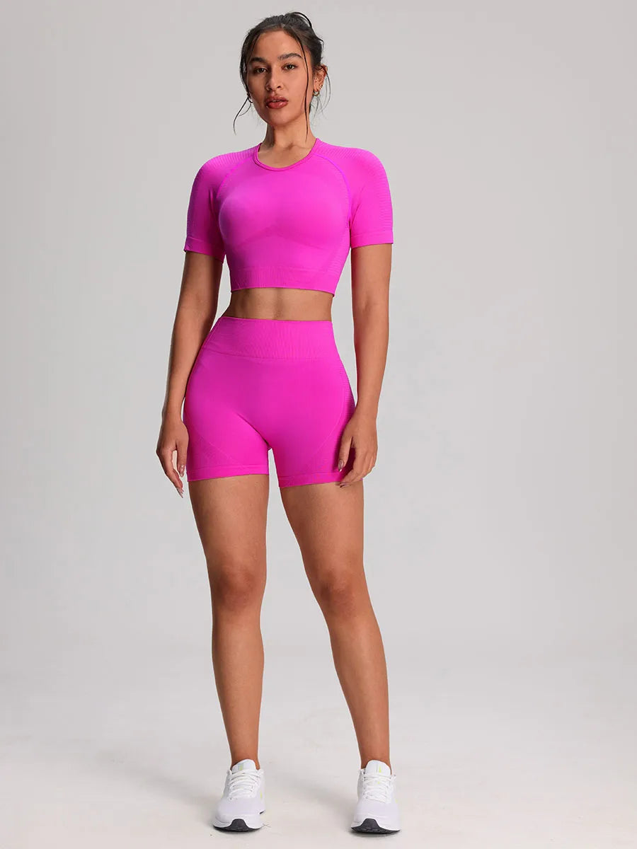 Women's fitness sportswear set with seamless yoga T-shirts, shorts, and leggings from The Clothing Company Sydney, ideal for gym and activewear.