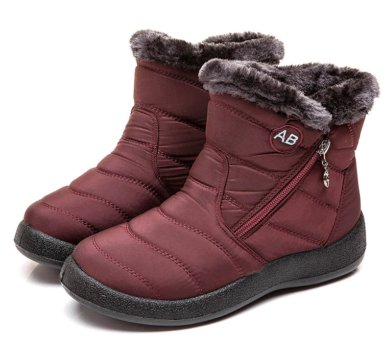 Women’s winter snow boots with warm fur lining and ankle height, designed for cold weather by The Clothing Company Sydney.