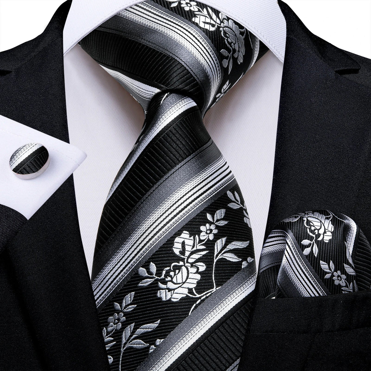 Men's gray paisley silk tie set with matching pocket square and cufflinks, perfect for wedding or formal occasions