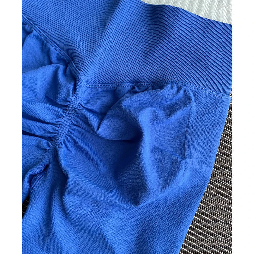 Solid seamless half pants for women, soft fitness shorts from The Clothing Company Sydney, ideal for yoga, gym, running, and cycling.