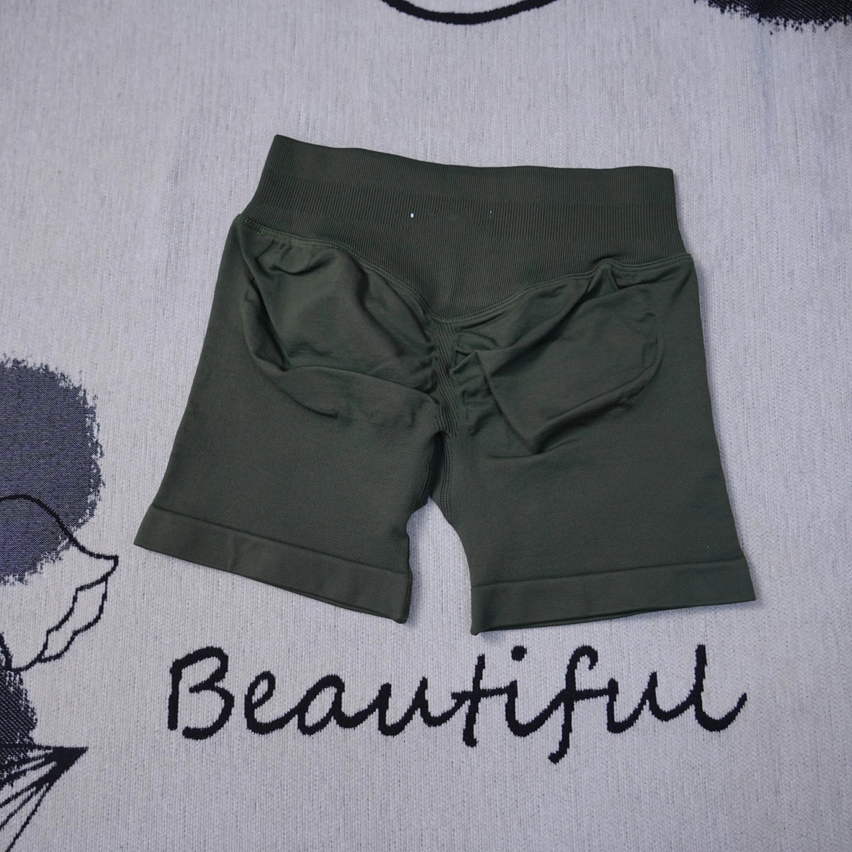 High-waisted women's seamless yoga shorts by The Clothing Company Sydney, breathable workout shorts for gym, running, and biking.