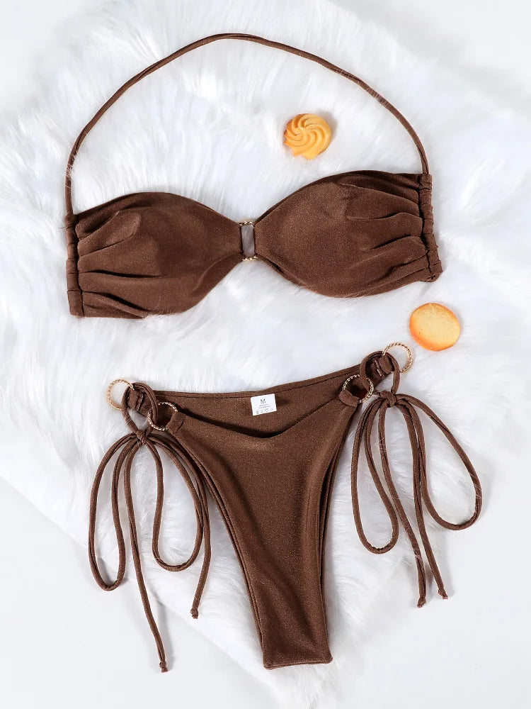 Two-piece push-up bikini set with hollow-out design, low waist swimwear from The Clothing Company Sydney, shown on a model.