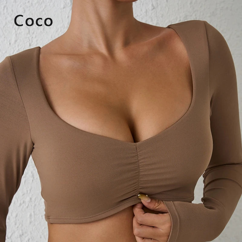 Nylon gym yoga long-sleeved women's top with pleated design, waist fit, suitable for fitness and sports by The Clothing Company Sydney