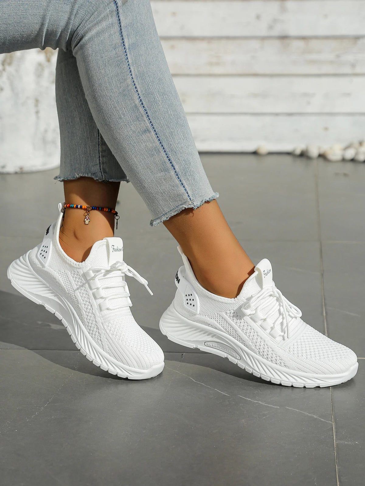 Women's fall casual sneakers by The Clothing Company Sydney featuring fly weave design and lace-up closure.