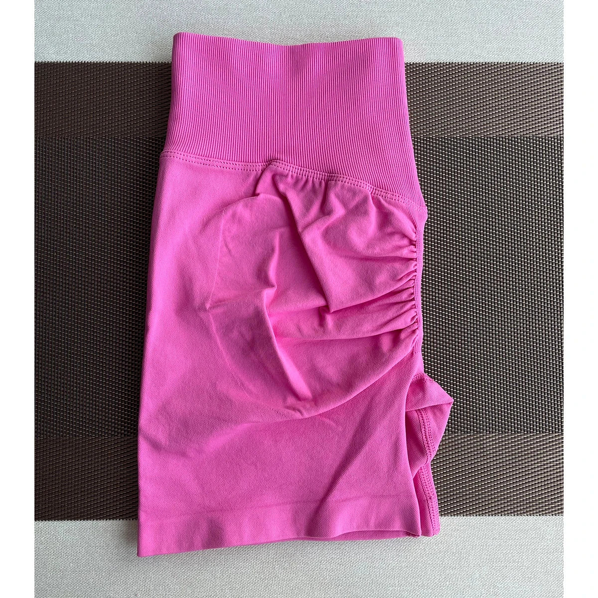 Solid seamless half pants for women by The Clothing Company Sydney, soft fitness shorts ideal for yoga, gym, running, or biking.