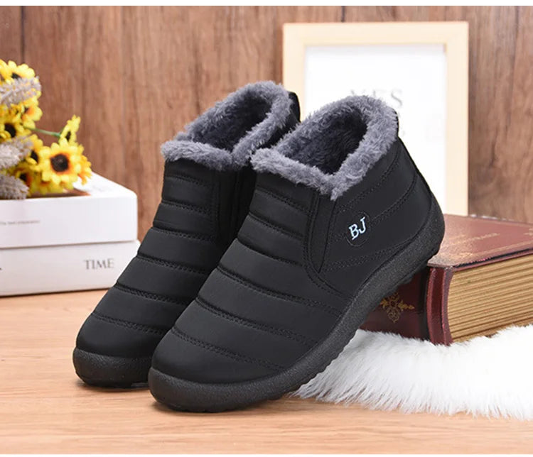 Women’s waterproof fur snow boots by The Clothing Company Sydney, slip-on ankle shoes with cozy fur lining and durable winter footwear.
