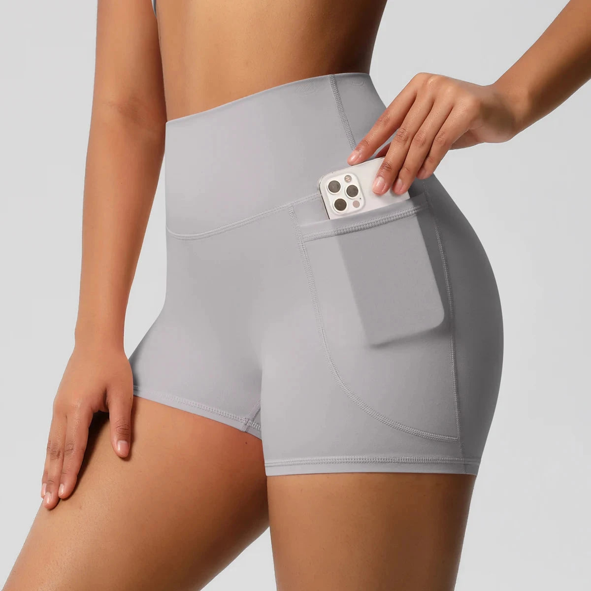 High-waisted bicycle yoga shorts by The Clothing Company Sydney, breathable, quick-drying gym pants with pockets for women.