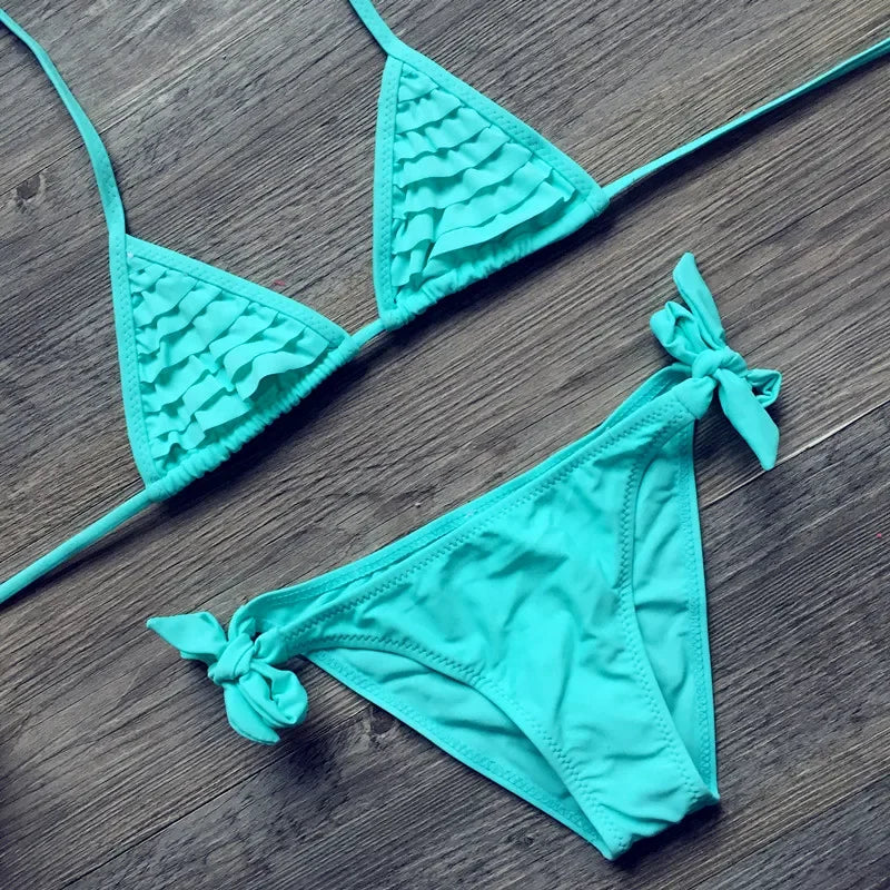 Two-piece girls' swimwear set by The Clothing Company Sydney, colorful children’s bathing suit and swimsuit for swimming fun.