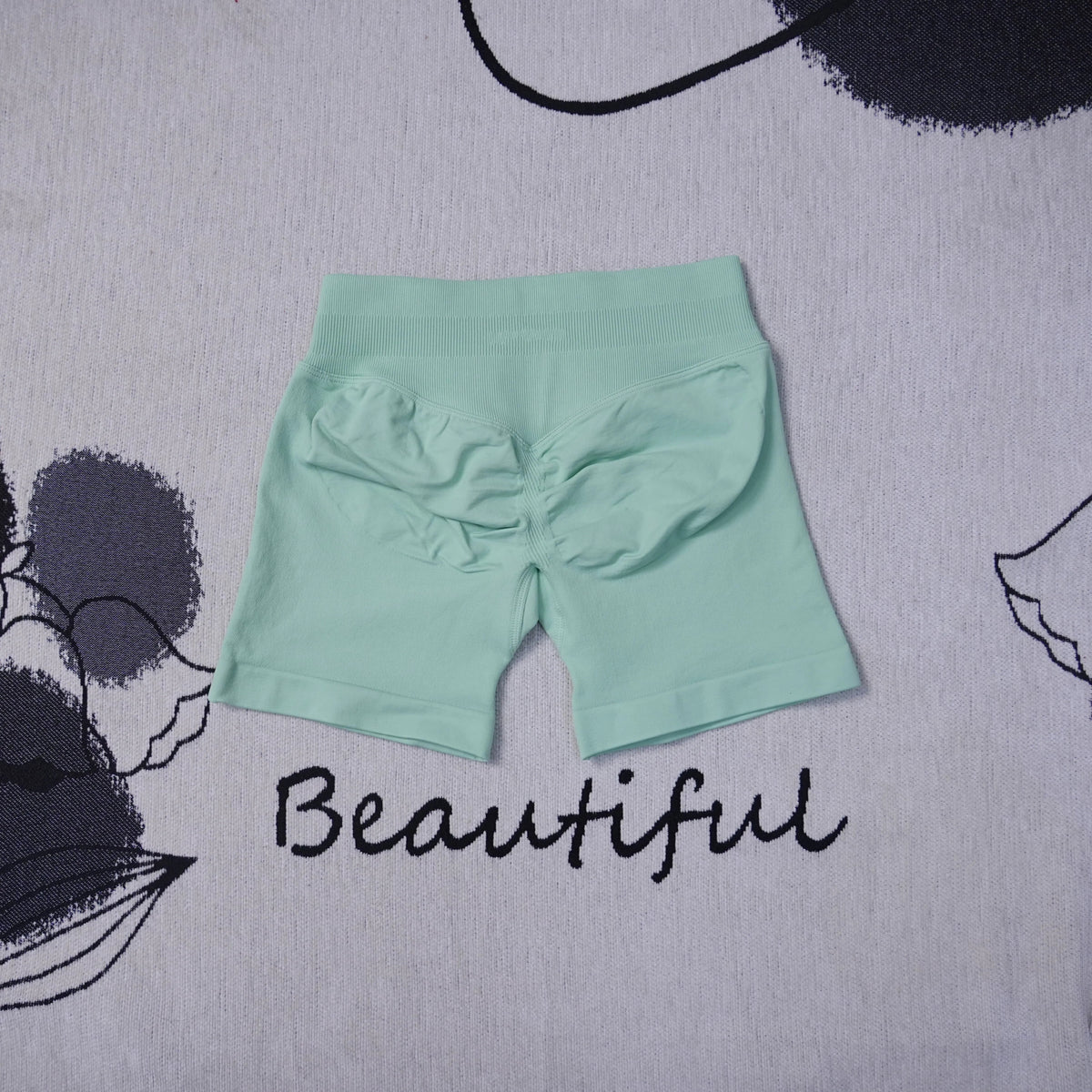 Women's high-waisted seamless yoga shorts by The Clothing Company Sydney, breathable gym and running shorts with butt-lifting fit.