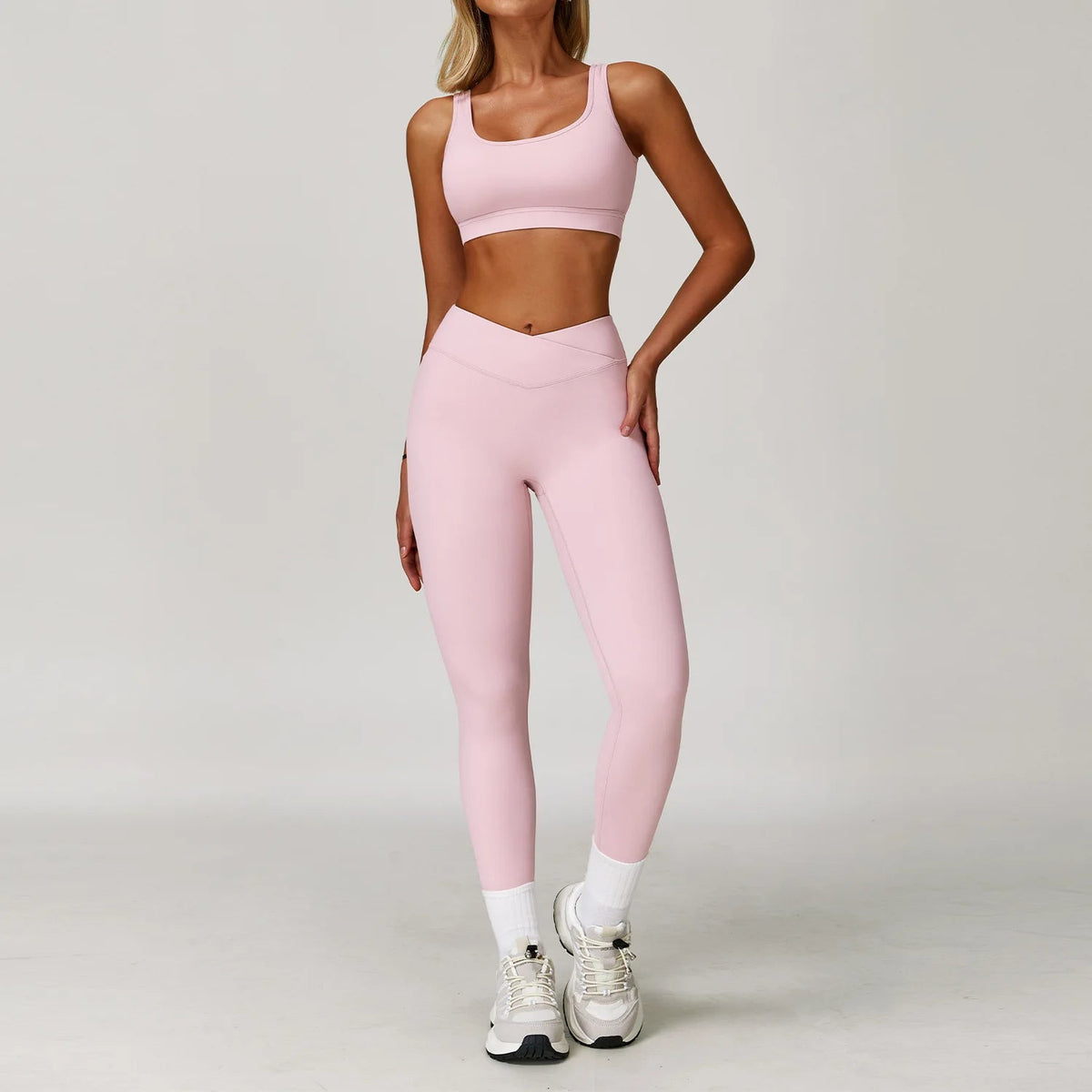 Women's fitness yoga gym clothes set by The Clothing Company Sydney, includes sports bra and matching leggings for workout and running.
