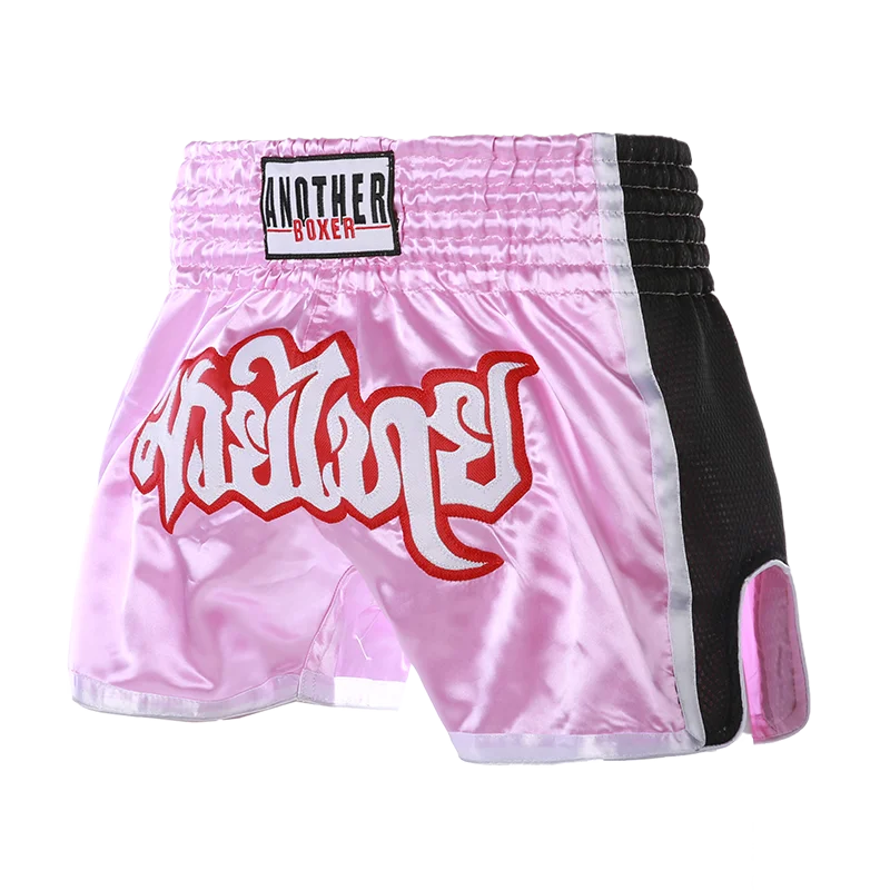 Embroidered Muay Thai boxing shorts from The Clothing Company Sydney with colorful stitching and lightweight fabric.