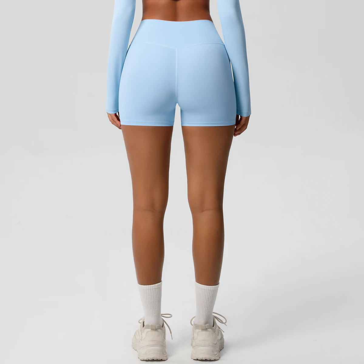 Women’s high waist yoga shorts by The Clothing Company Sydney, fitness leggings with push-up design and breathable fabric.