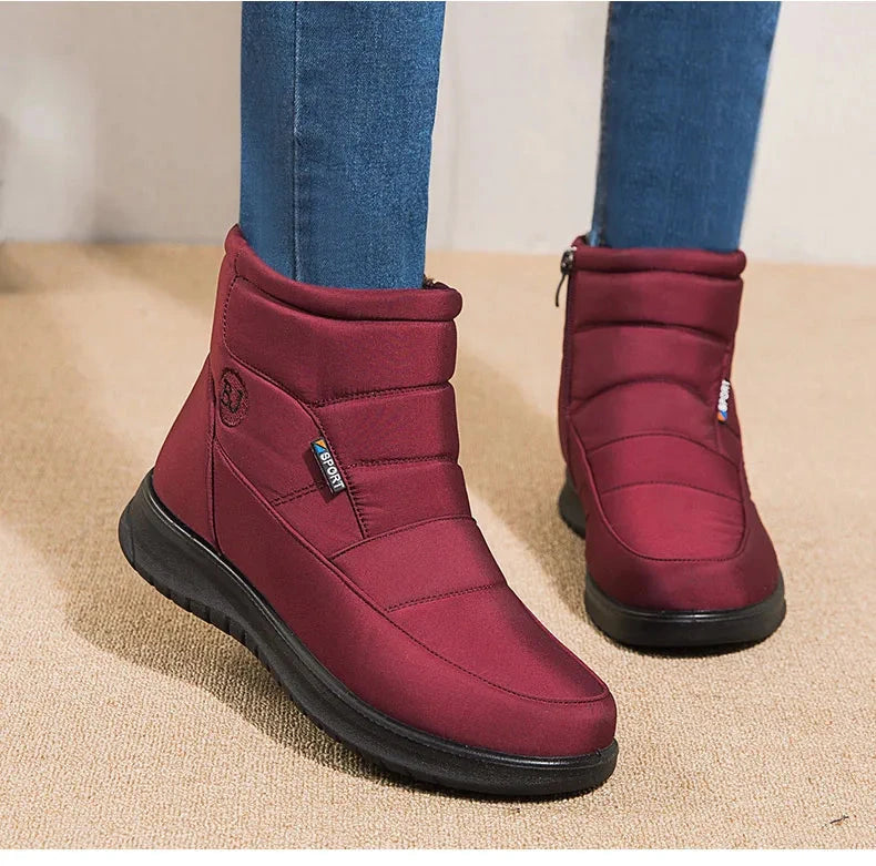 Women’s ankle low heel snow boots by The Clothing Company Sydney, winter flat footwear with a stylish, practical design.