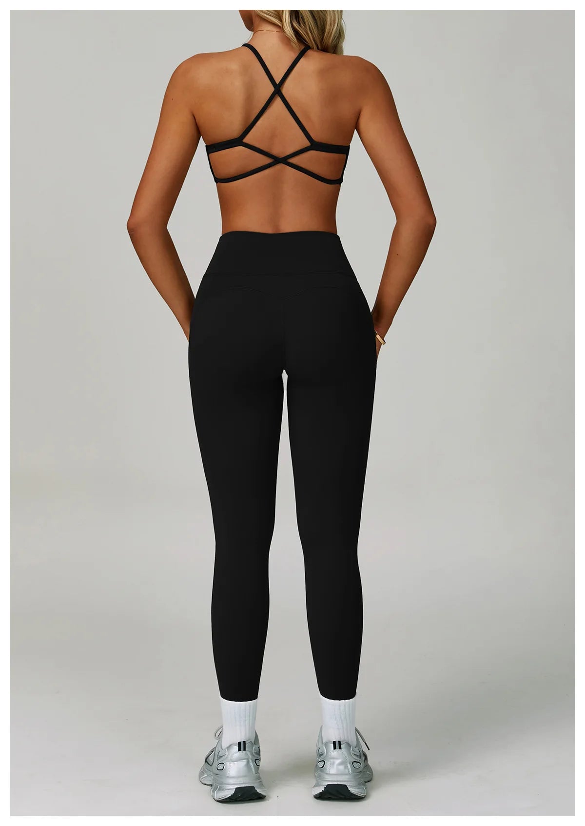 Women's fitness tracksuit set by The Clothing Company Sydney with high waist leggings and sports bra for yoga and workout activities.