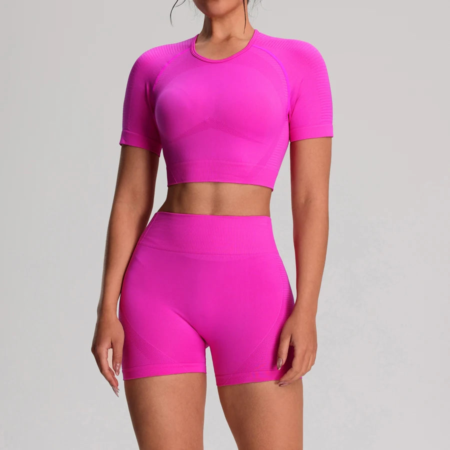 Women's fitness workout set including seamless sport T-shirts, shorts, and leggings from The Clothing Company Sydney.