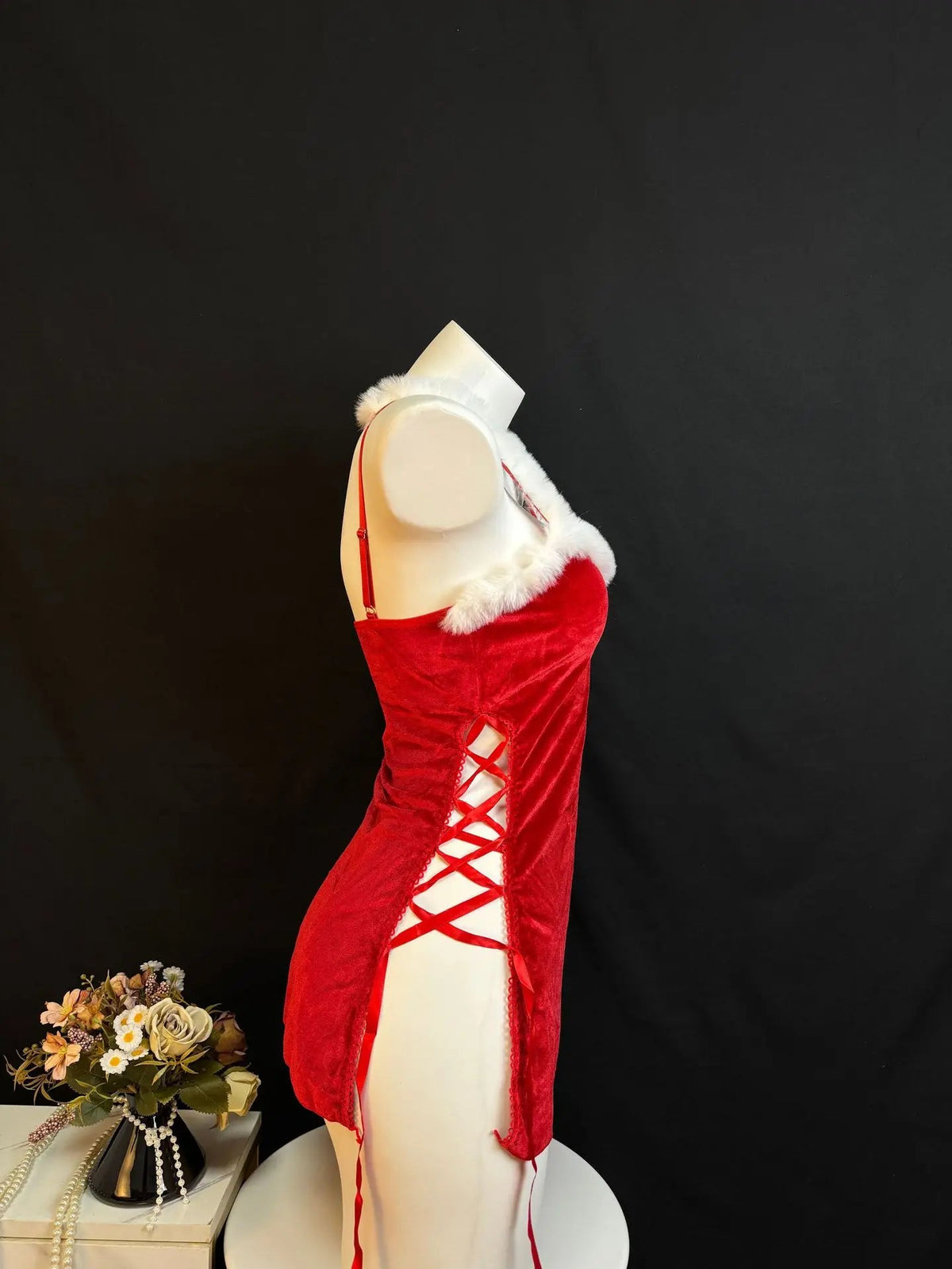 Elegant women’s Christmas dress set by The Clothing Company Sydney featuring a sparkling red velvet dress with split straps and a matching thong.