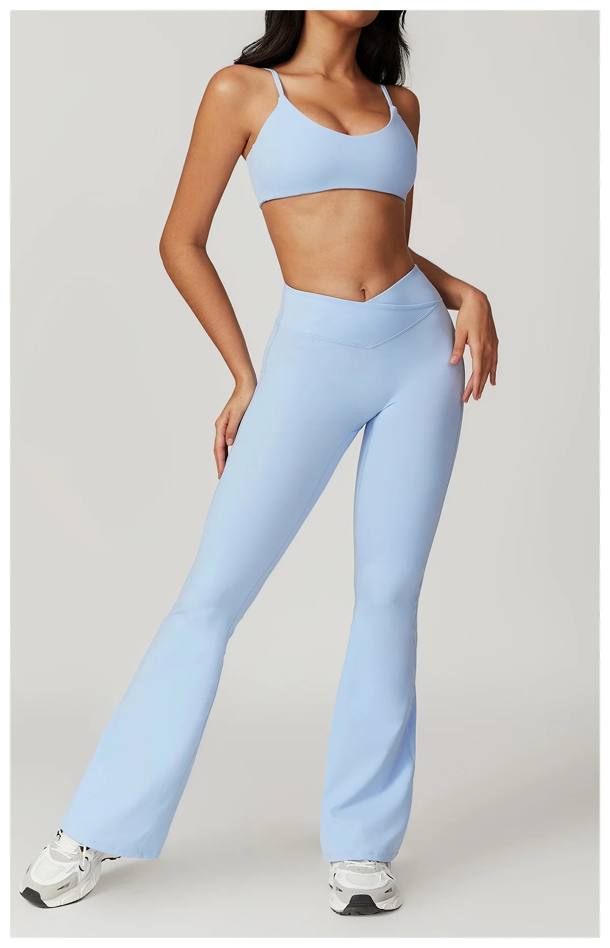 Two-piece women's fitness yoga gym set with short sleeve crop top and leggings, from The Clothing Company Sydney.