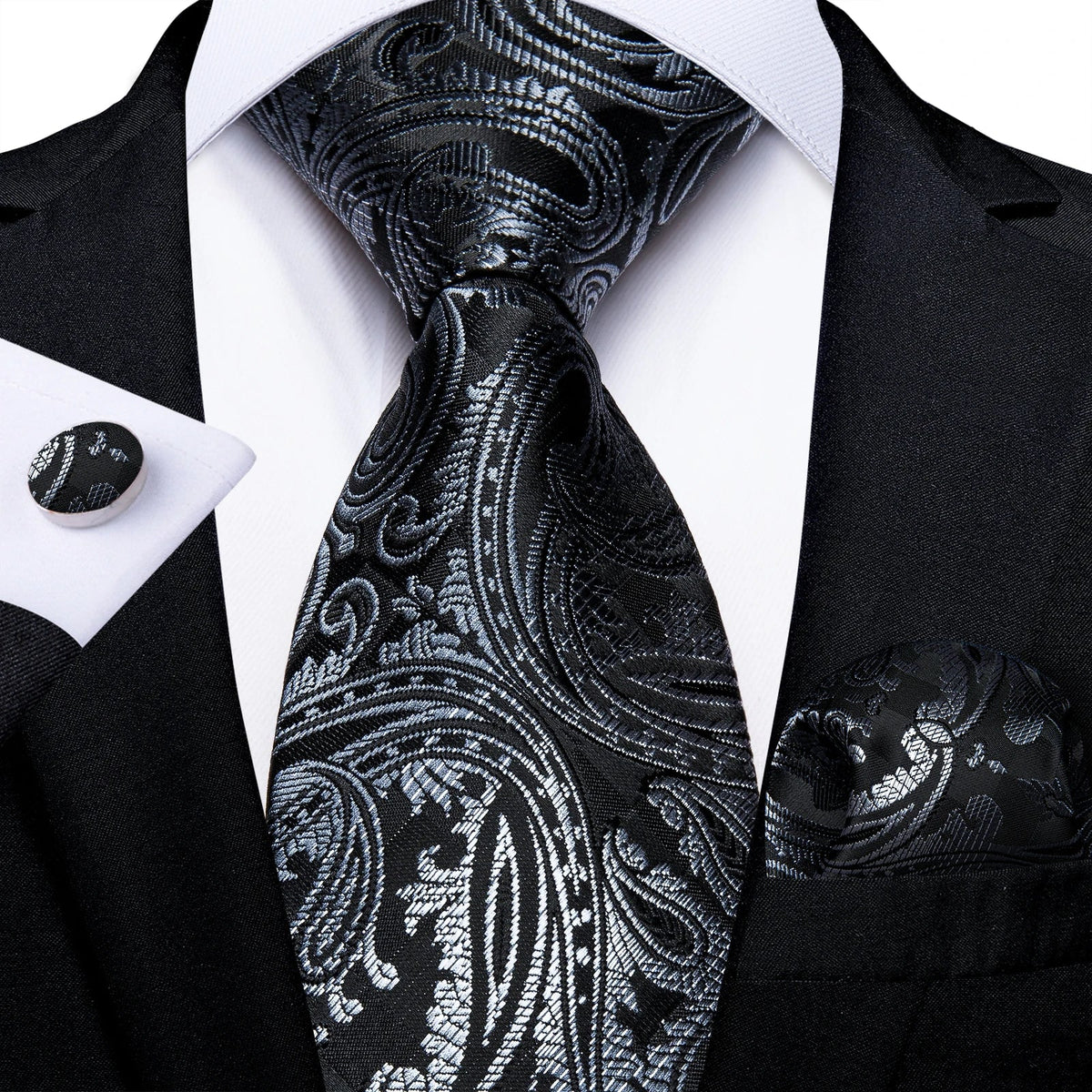 Men's gray paisley silk tie set with wedding tie, pocket square, and cufflinks, featuring elegant paisley design and classic style.