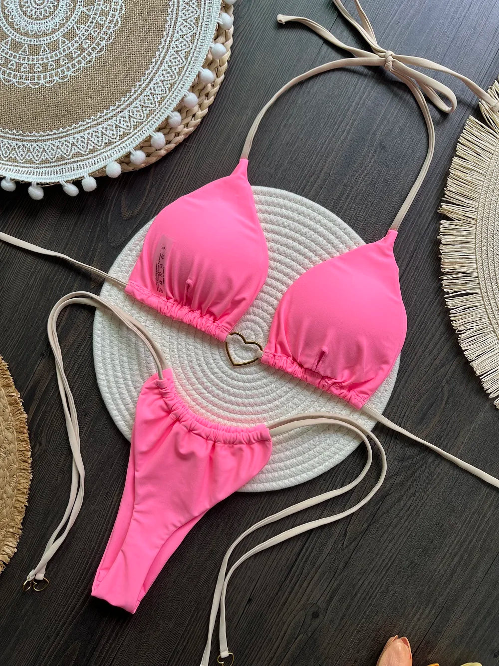 Solid color halter bikini set for women featuring a triangle top and thong bottom, designed by The Clothing Company Sydney.