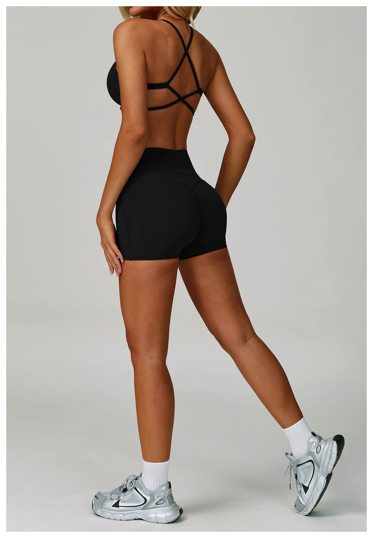 Women's fitness tracksuit set by The Clothing Company Sydney featuring high waist leggings and a workout sports bra for yoga or gym.