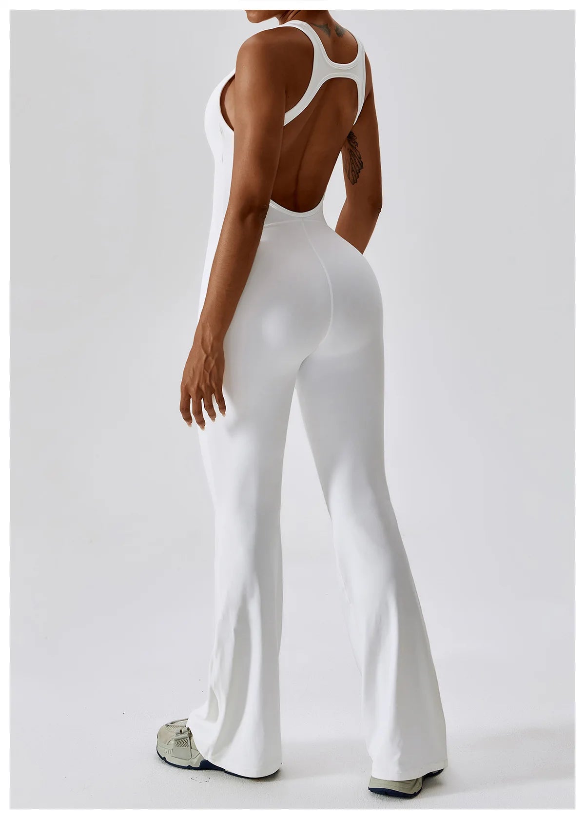Open back V jumpsuit gym set for women by The Clothing Company Sydney, suitable for yoga, training, and fitness workouts.
