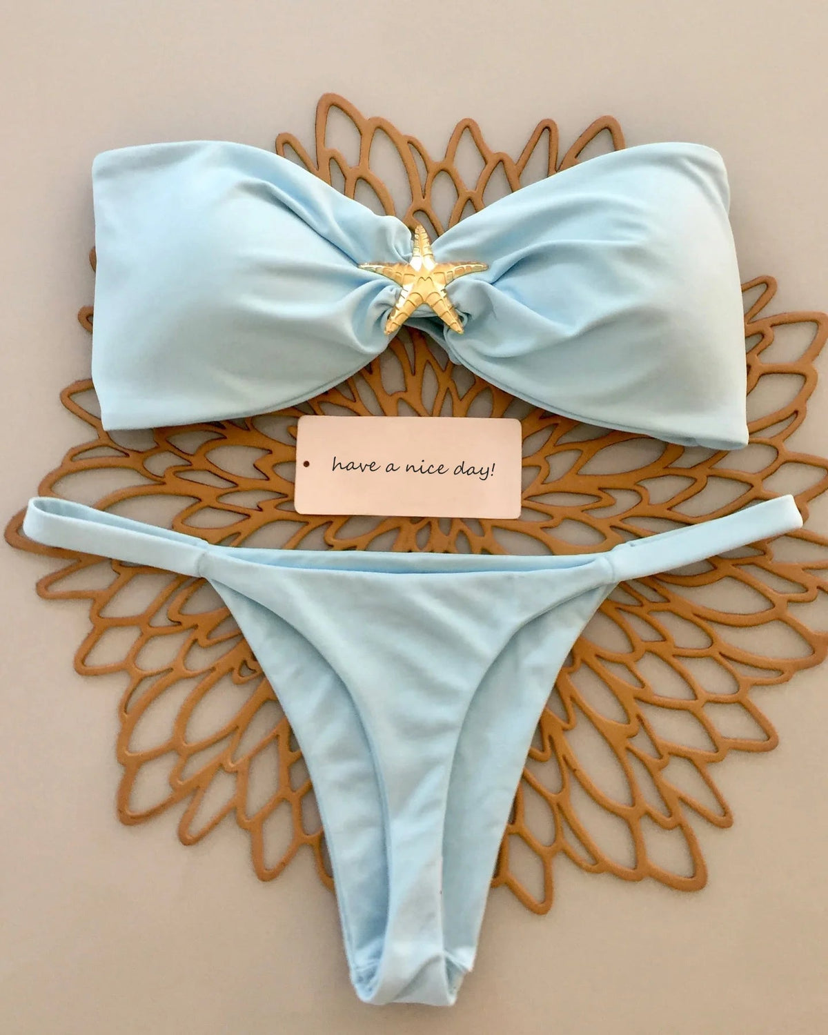 Two-piece push-up bikini swimsuit by The Clothing Company Sydney featuring a bandeau top and micro bikini bottom for beachwear.