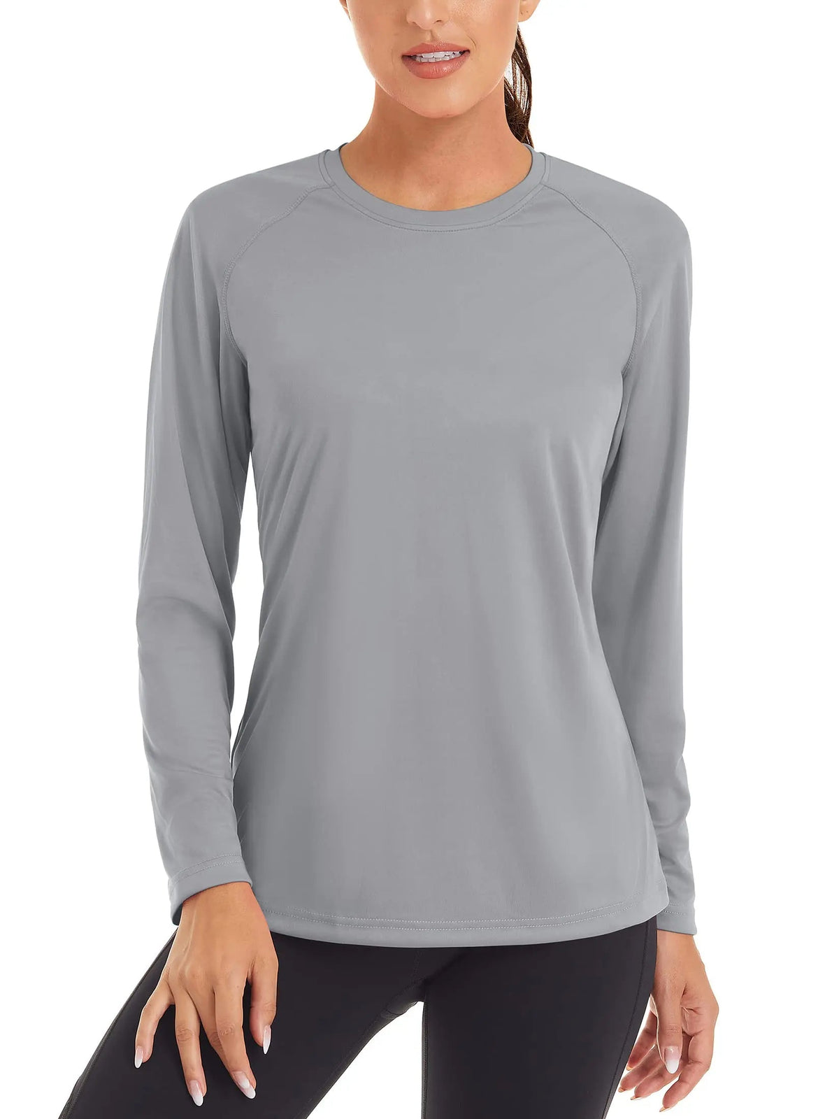 Women's UPF 50+ quick-dry long sleeve swim T-shirt by The Clothing Company Sydney with UV protection, perfect for summer outdoor activities.