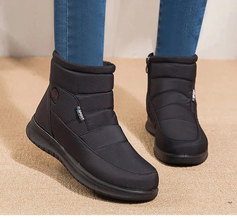 Women’s ankle low heel snow boots by The Clothing Company Sydney, winter flat footwear with a cozy, snow-ready design.