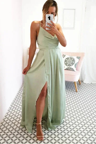 Mint green satin bridesmaid dress with side slit, backless design, spaghetti straps, long evening gown for summer weddings.