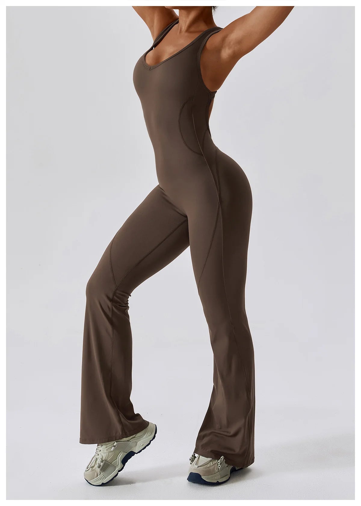 Women’s open back V jumpsuit from The Clothing Company Sydney, stylish fitness gym set with stretch for training and yoga workouts.