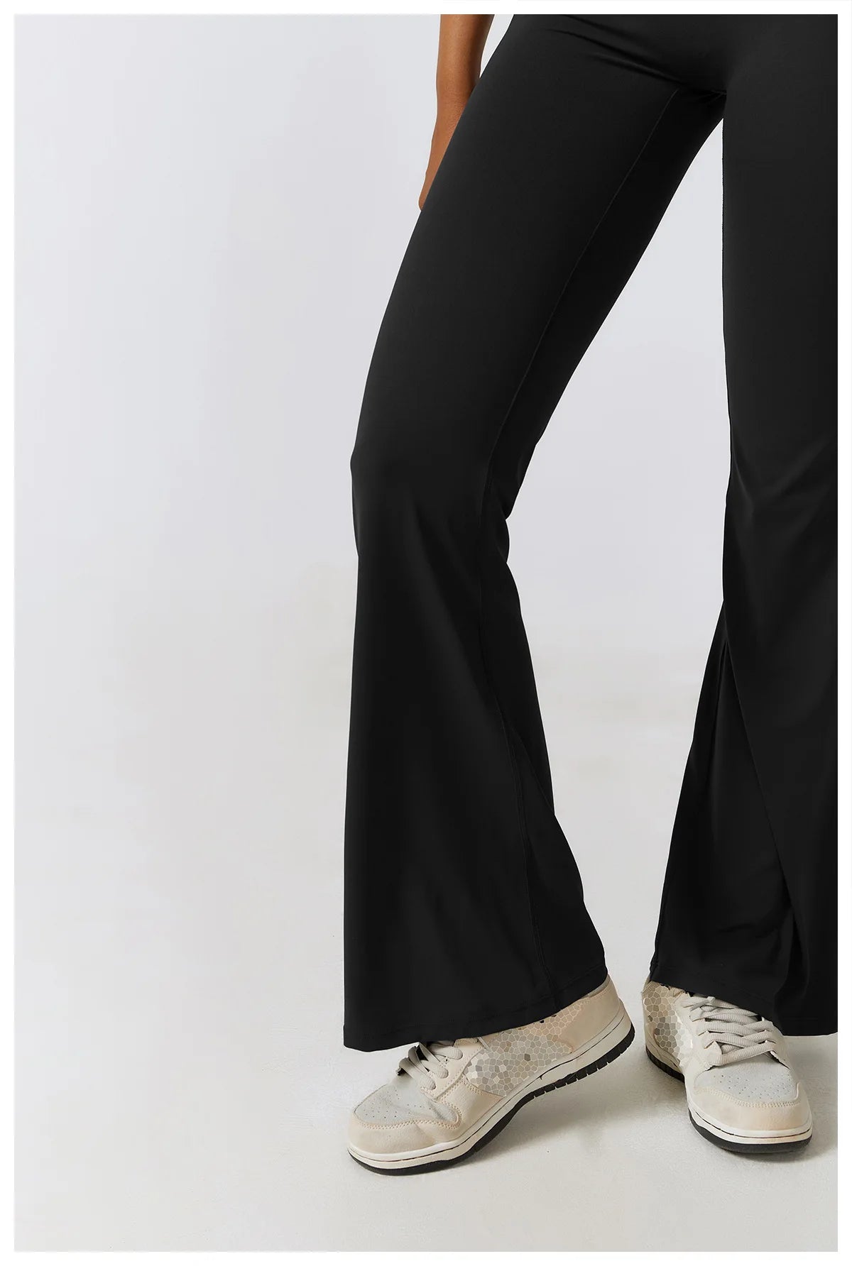 Open back V-neck yoga jumpsuit by The Clothing Company Sydney, featuring a fitted stretch workout bodysuit for women’s fitness training.