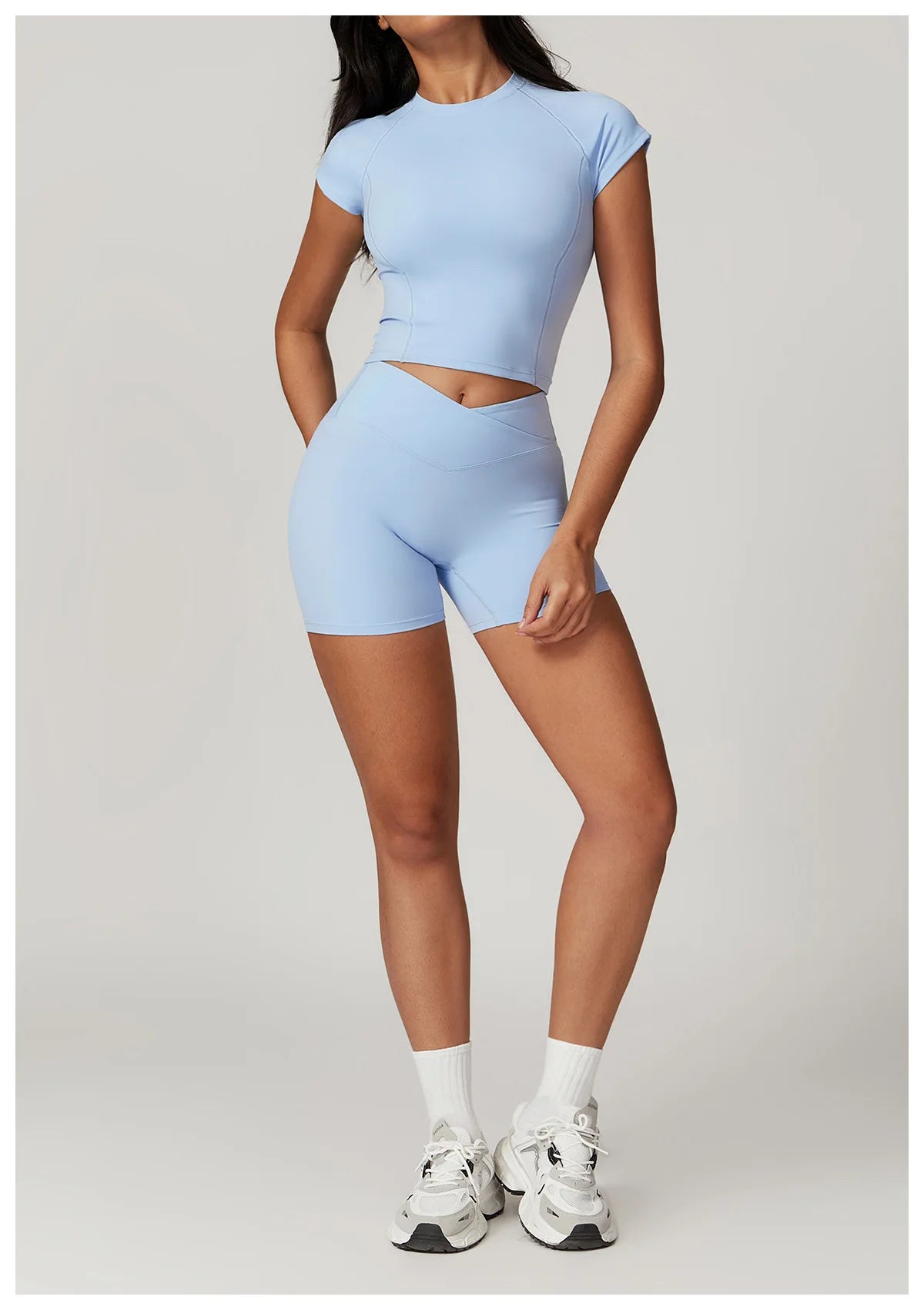 Set of two women's fitness yoga gym clothes including crop top, sports bra, and leggings from The Clothing Company Sydney.