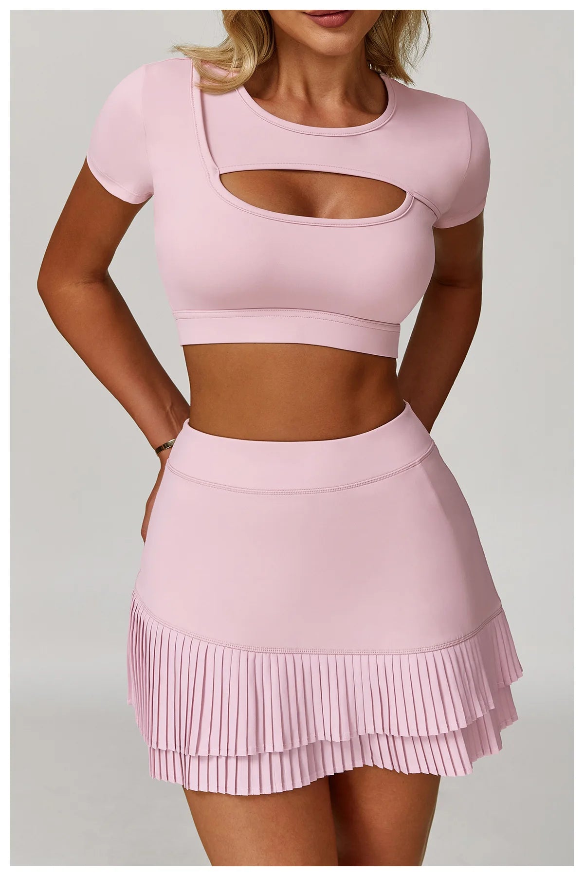 Two-piece women's fitness workout set with sports bra and leggings by The Clothing Company Sydney, ideal for yoga and gym exercises.