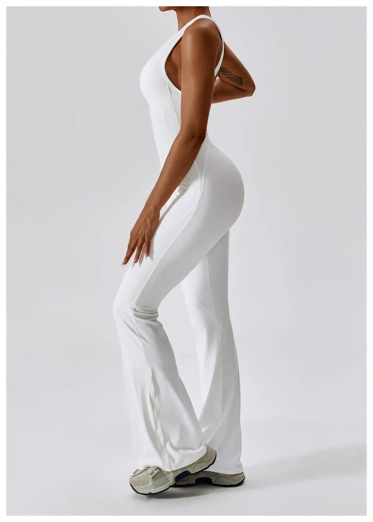 Open back V jumpsuit gym set by The Clothing Company Sydney, stylish women’s fitness yoga sportswear with stretch for workouts.
