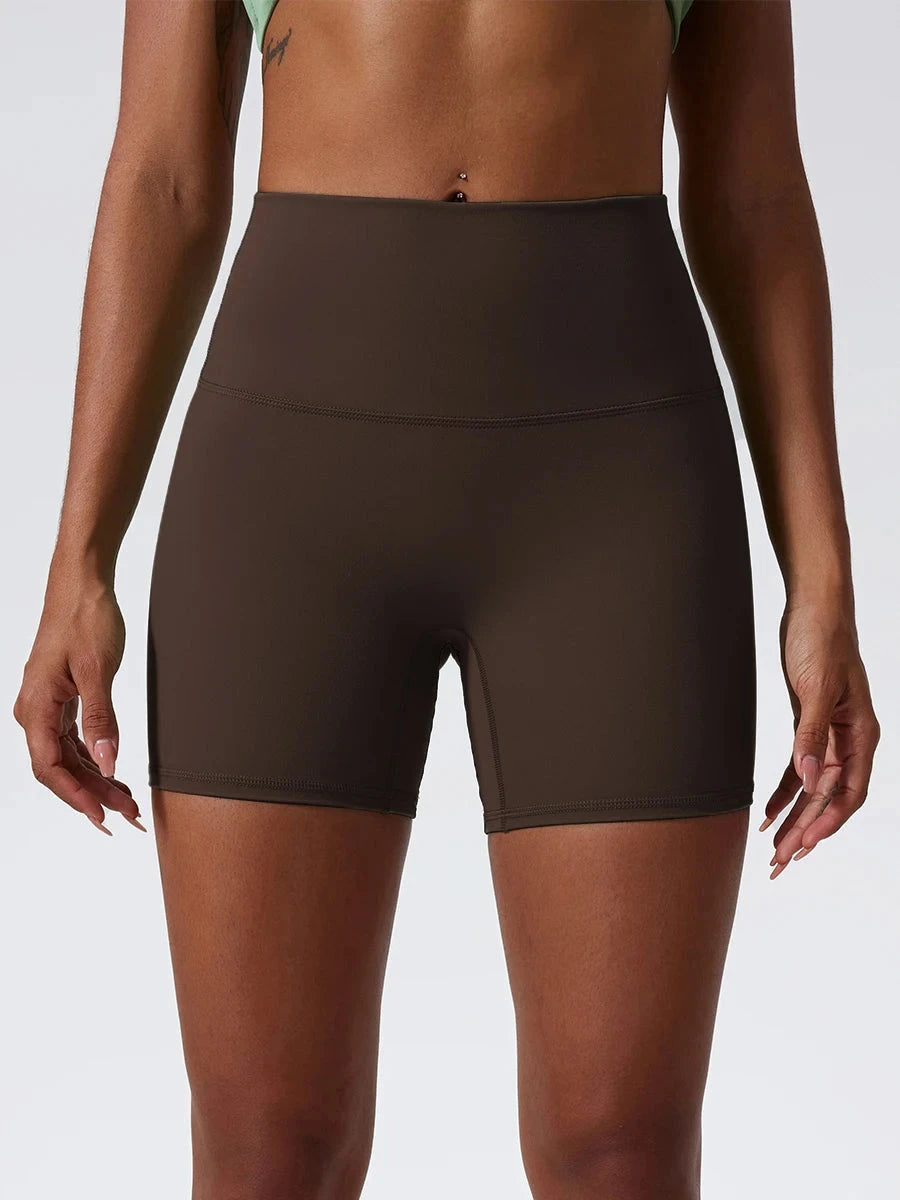 High-waist yoga shorts for women by The Clothing Company Sydney, featuring a fitted gym and workout design with supportive leg coverage.